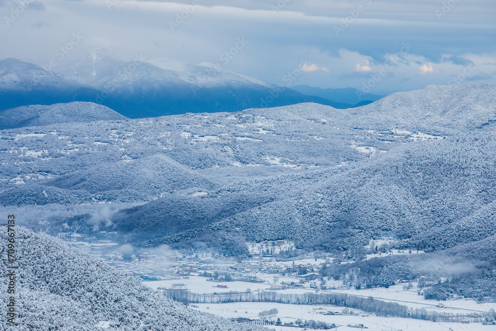 Fototapeta premium Winter snowfall in Collada De Bracons and Puigsacalm peak, La Garrotxa, Girona, Spain