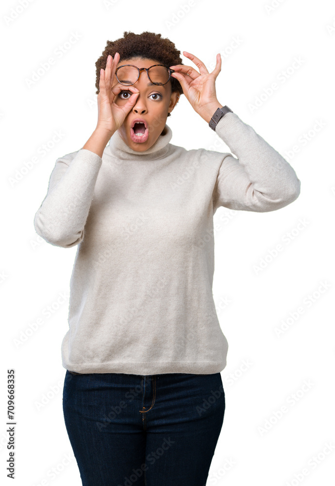 Young beautiful african american woman wearing glasses over isolated background doing ok gesture shocked with surprised face, eye looking through fingers. Unbelieving expression. Young beautiful african american woman wearing glasses over isolated background doing ok gesture shocked with surprised face, eye looking through fingers. Unbelieving expression.