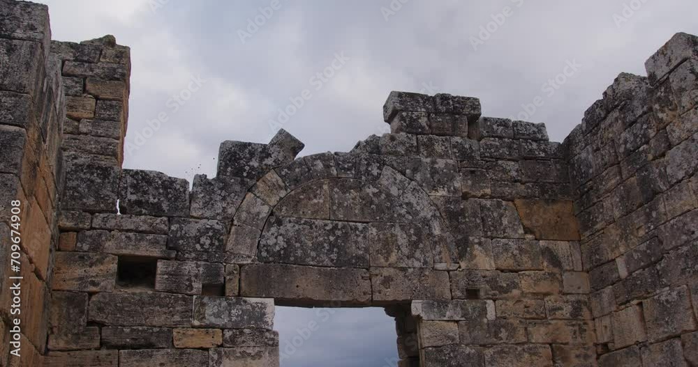 Tilt down of a doorway of an ancient buildings in Hierapolis. Tilt down of a doorway of an ancient buildings in Hierapolis.