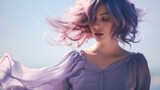 Ethereal beauty of a young woman with flowing purple hair, matching her light dress against a blue sky.
