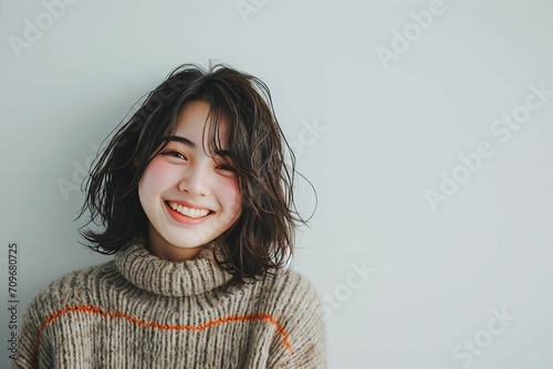 セーターを着た日本人女性のポートレート（美容・婚活・結婚・バレンタイン）