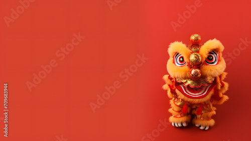 Happy Chinese New Year, golden lion dance on Chinese New Year on red background. © Phata