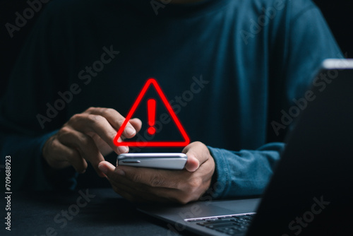 Person use smartphone with System error warning and Maintenance. Notification error and virus detection spyware. illegal connection and information danger.