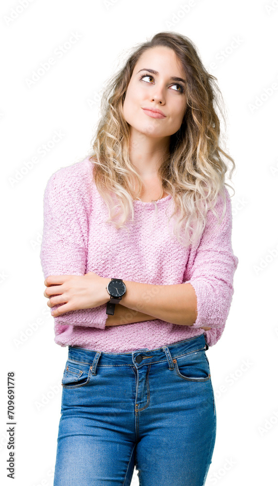 Beautiful young blonde woman over isolated background smiling looking side and staring away thinking.