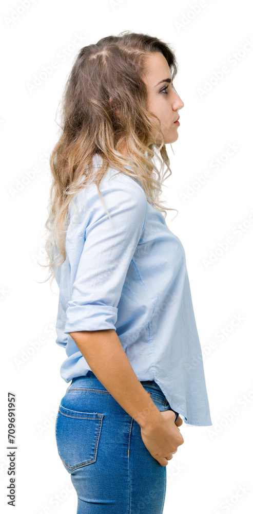 Beautiful young blonde business woman over isolated background looking to side, relax profile pose with natural face with confident smile. Beautiful young blonde business woman over isolated background looking to side, relax profile pose with natural face with confident smile.