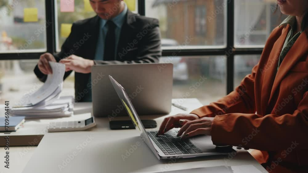 Close up of hands teamwork business group are calculate working and brainstorming about business financial and marketing. Close up of hands teamwork business group are calculate working and brainstorming about business financial and marketing.