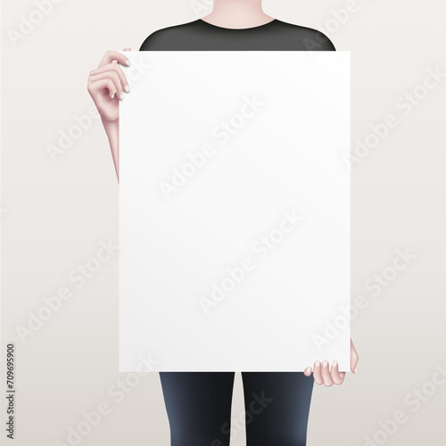 The girl holding a white empty sheet of paper