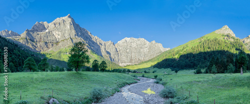 The morning panorama of north walls of Karwendel mountains - walls of Spritzkar spitze and Grubenkar spitze from Enger tall - Grosser Ahornboden walley.