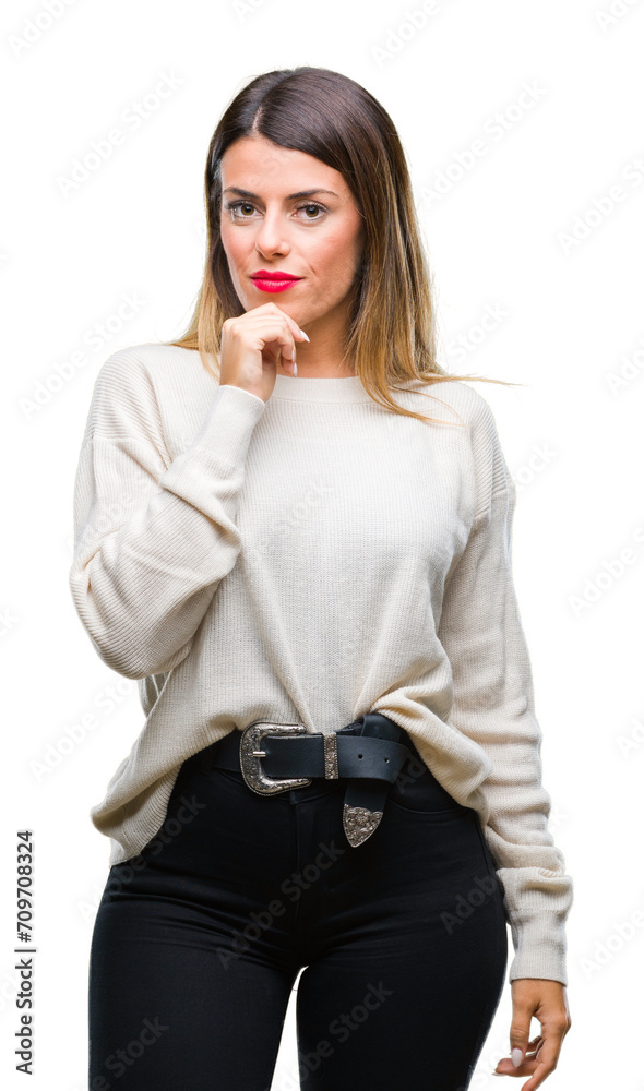 Young beautiful woman casual white sweater over isolated background looking confident at the camera with smile with crossed arms and hand raised on chin. Thinking positive. Young beautiful woman casual white sweater over isolated background looking confident at the camera with smile with crossed arms and hand raised on chin. Thinking positive.