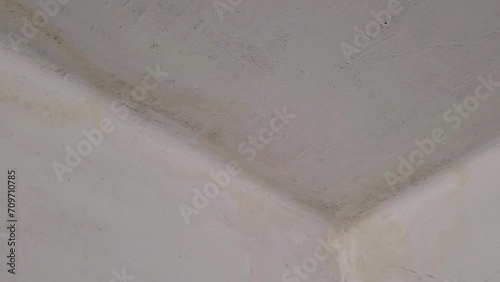 Roof leakage, water dameged ceiling roof and stain on ceiling close-up