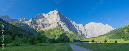 The morning panorama of north walls of Karwendel mountains - walls of Spritzkar spitze and Grubenkar spitze from Enger tall  - Grosser Ahornboden walley. photo