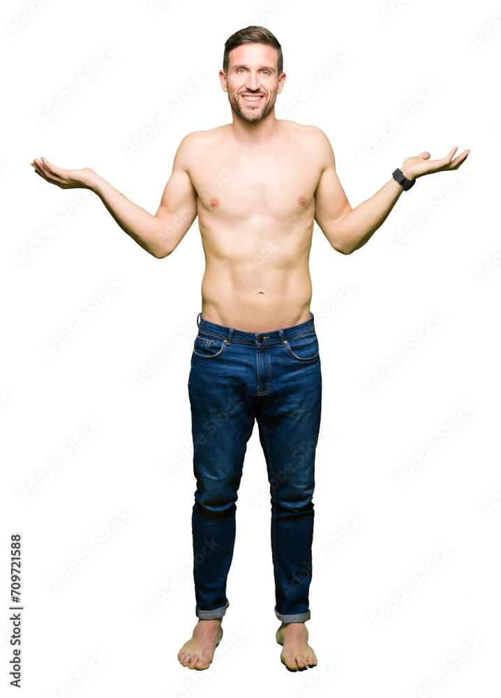 Handsome shirtless man showing nude chest Smiling showing both hands open palms, presenting and advertising comparison and balance Handsome shirtless man showing nude chest Smiling showing both hands open palms, presenting and advertising comparison and balance