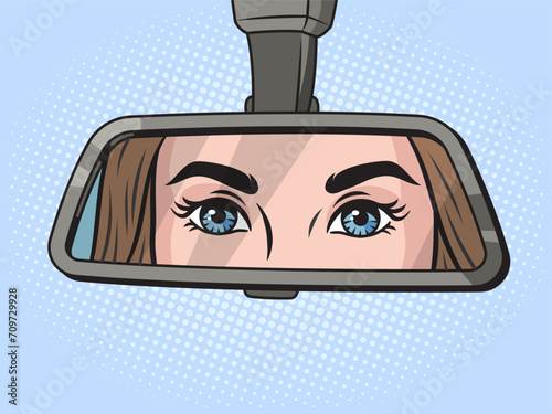 Woman eyes in the rear view mirror of a car pop art retro hand drawn vector illustration. Comic book style imitation.