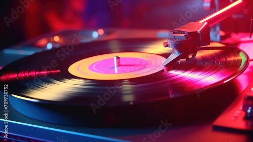 Vinyl record playing on old retro turntable. Vinyl record player in neon colors. 80s and 90s music and design.