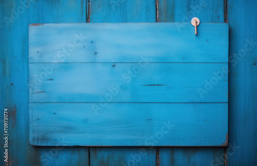 Vintage Blue Wooden Wall: A Textured Abstract Retro Design with Cracked Paint and Aged Pattern