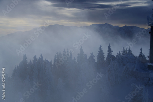fog over the mountains, Postavaru Mountains, Romania. Viewpoint to Bucegi Mountains