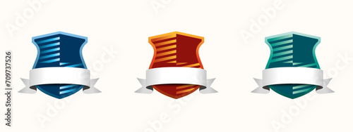 A shield-shaped emblem design with a ribbon belt.
