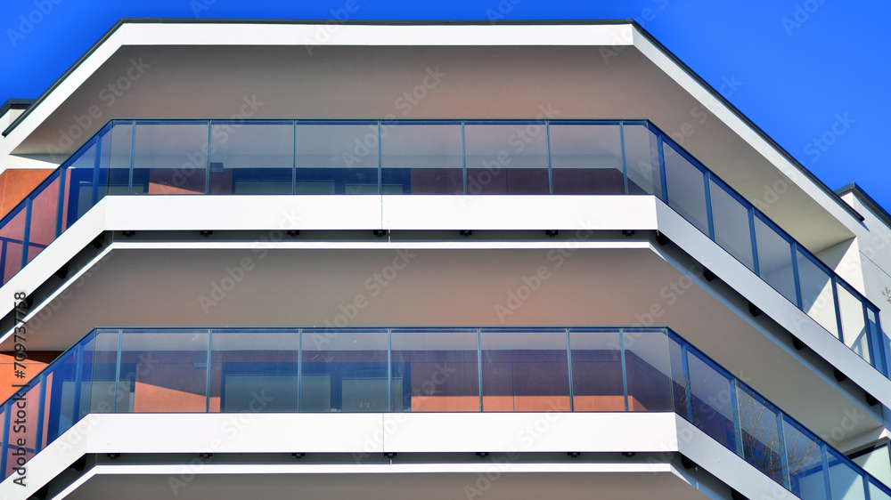 Obraz premium Residential area with modern apartment building. Multi Storey modern, new and stylish living block of flats.