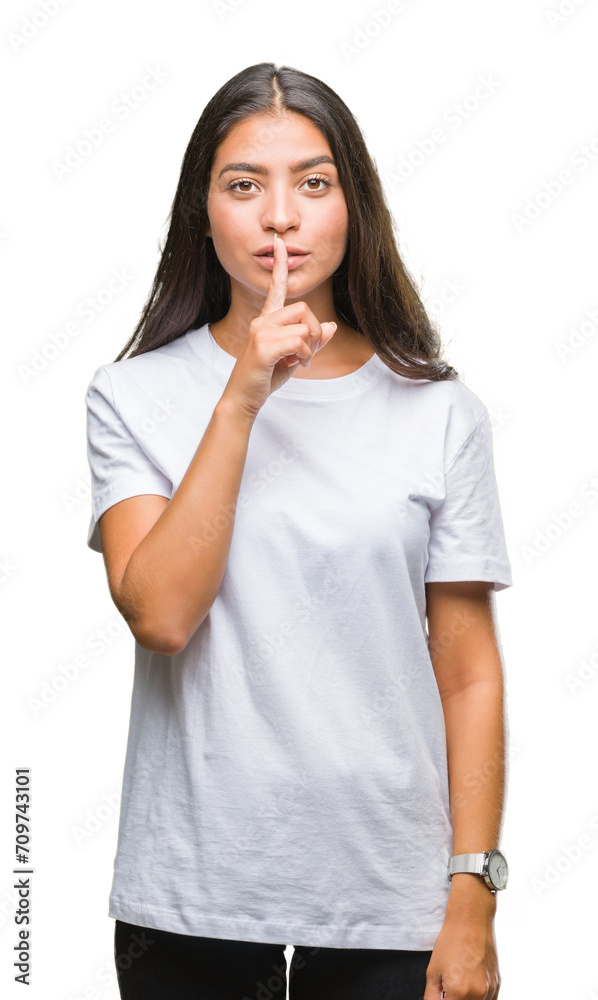 Young beautiful arab woman over isolated background asking to be quiet with finger on lips. Silence and secret concept. Young beautiful arab woman over isolated background asking to be quiet with finger on lips. Silence and secret concept.