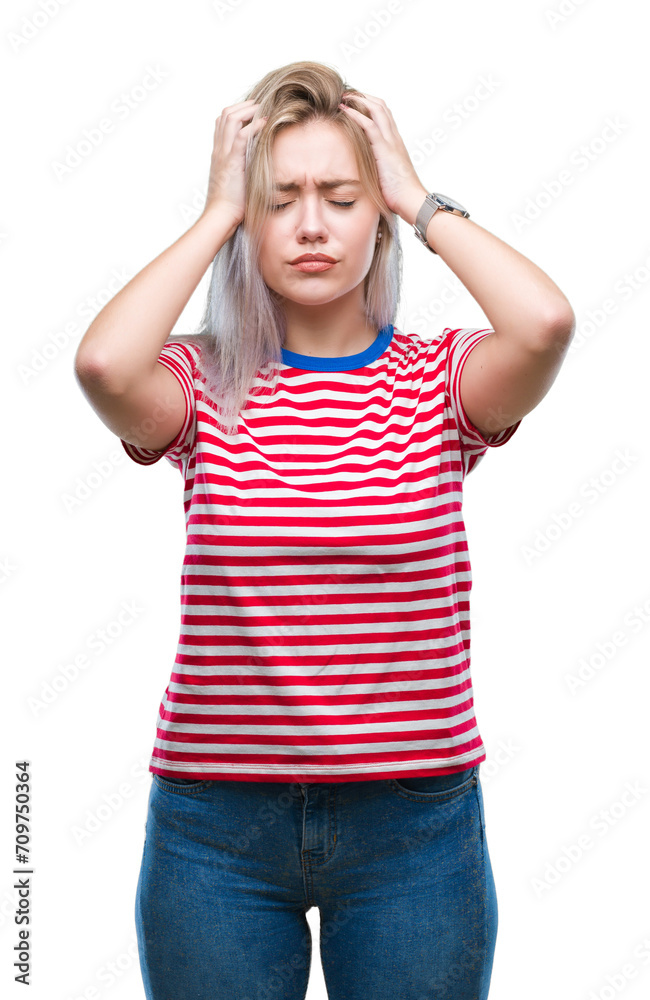Young blonde woman over isolated background suffering from headache desperate and stressed because pain and migraine. Hands on head. Young blonde woman over isolated background suffering from headache desperate and stressed because pain and migraine. Hands on head.