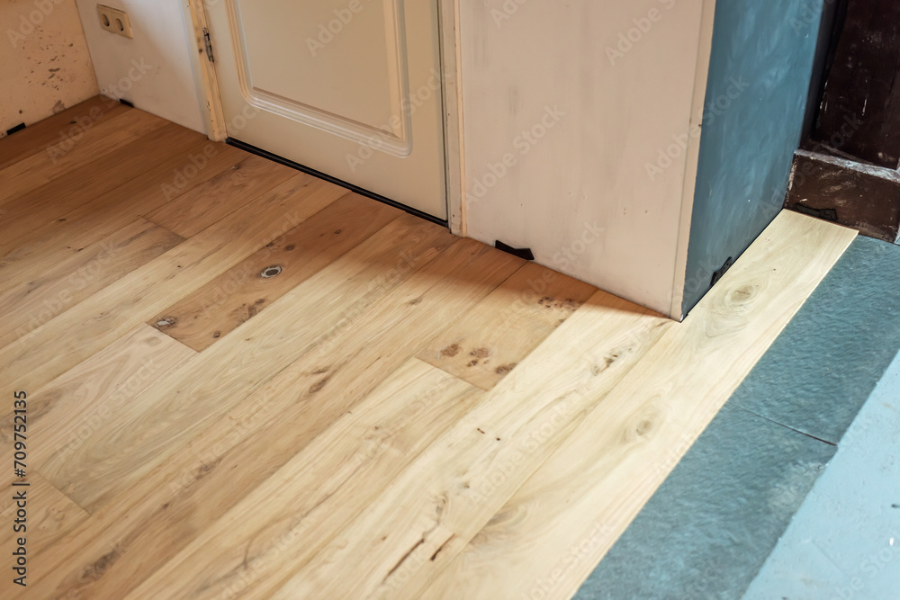 Newly laid parquet floor with insulation floor. Newly laid parquet floor with insulation floor.