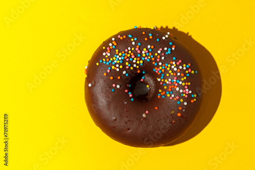 Wallpaper Mural chocolate donuts on a yellow background Torontodigital.ca