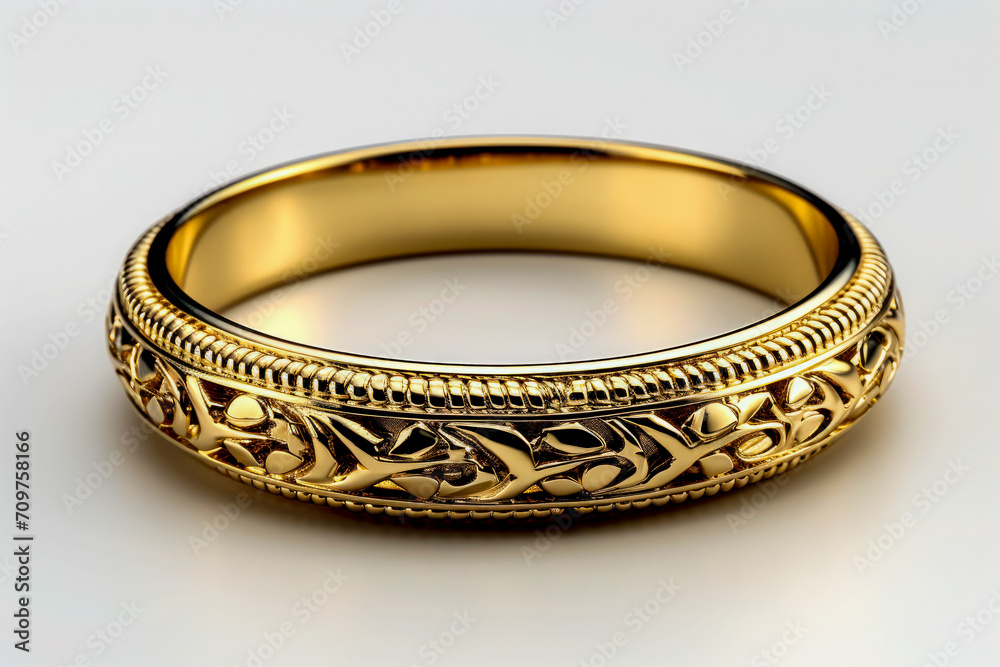 Intricate Gold Wedding Band on White Background Intricate Gold Wedding Band on White Background