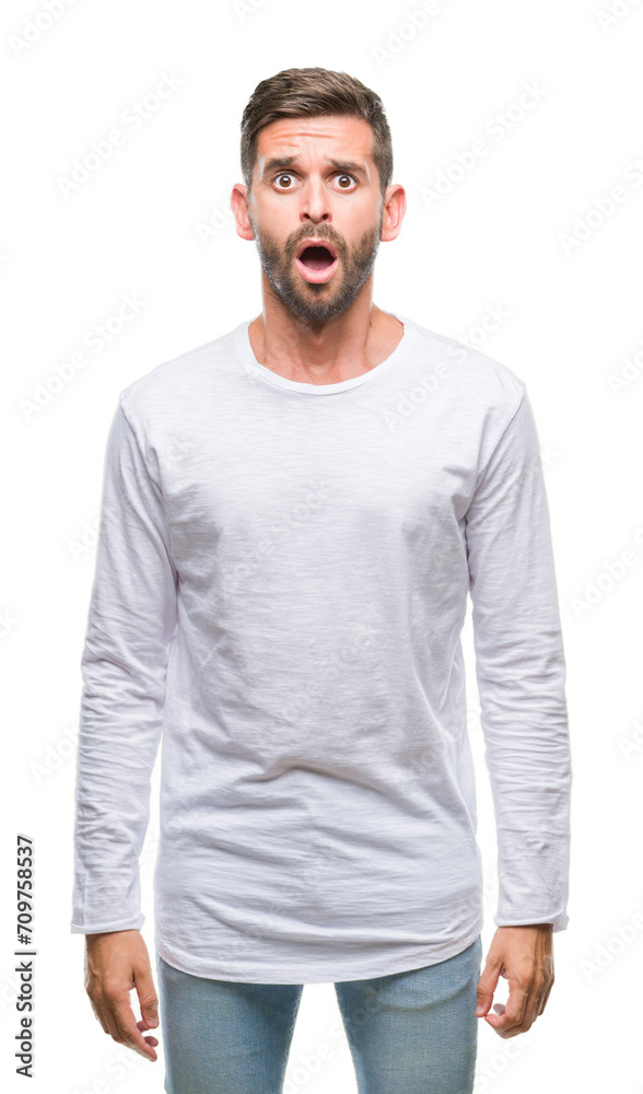 Young handsome man over isolated background afraid and shocked with surprise expression, fear and excited face. Young handsome man over isolated background afraid and shocked with surprise expression, fear and excited face.