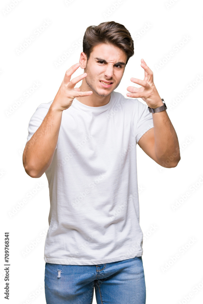 Young handsome man wearing white t-shirt over isolated background Shouting frustrated with rage, hands trying to strangle, yelling mad Young handsome man wearing white t-shirt over isolated background Shouting frustrated with rage, hands trying to strangle, yelling mad