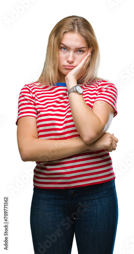 Young caucasian woman over isolated background thinking looking tired and bored with depression problems with crossed arms.