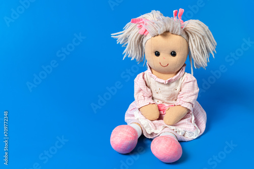Isolated old doll toy for a child