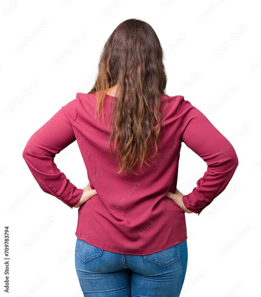 Beautiful plus size young woman over isolated background standing backwards looking away with arms on body Beautiful plus size young woman over isolated background standing backwards looking away with arms on body