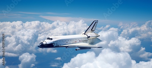 Magnificent space shuttle effortlessly gliding through the serene cotton candy cloudscape © Ilja