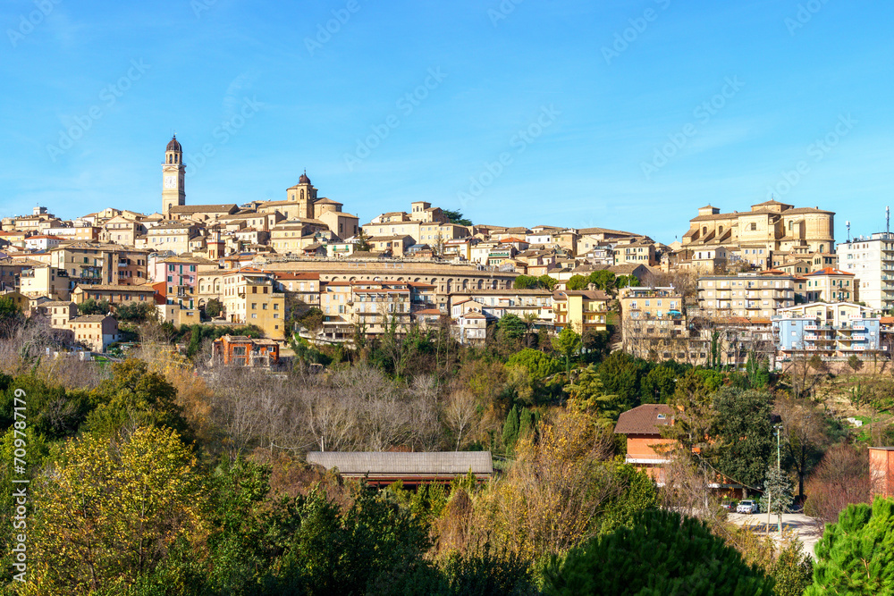 italian hillside town with old buildings and features