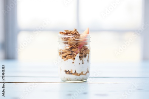 almond butter swirl in a breakfast yogurt parfait photo