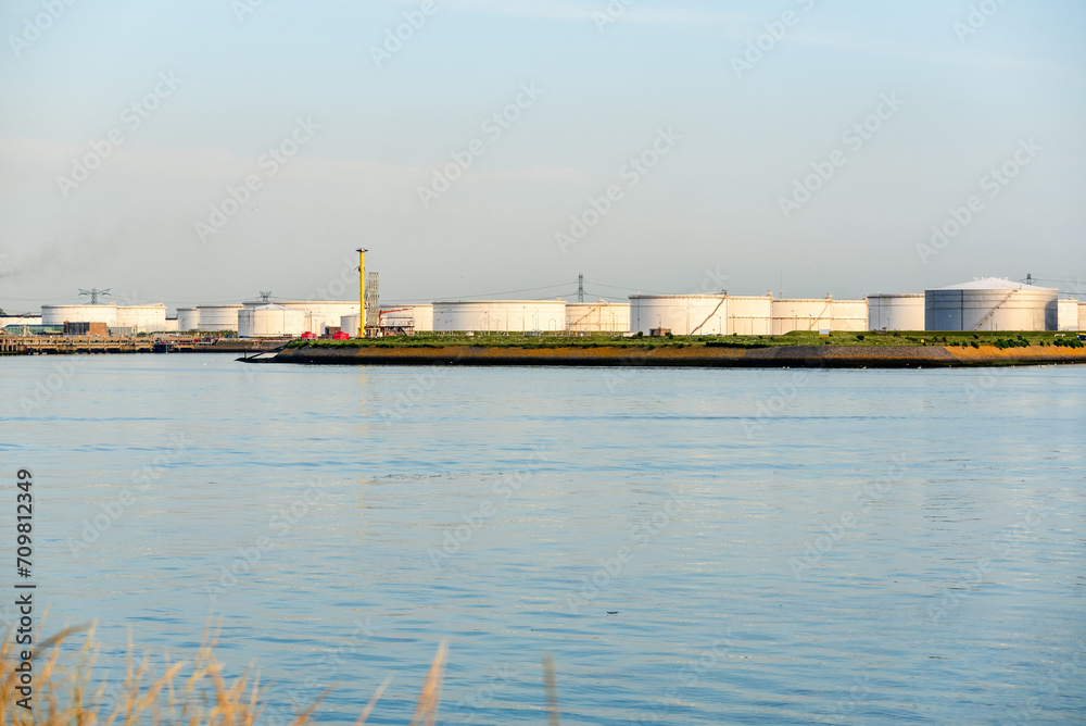 View of a oil terminal at sunset in summer