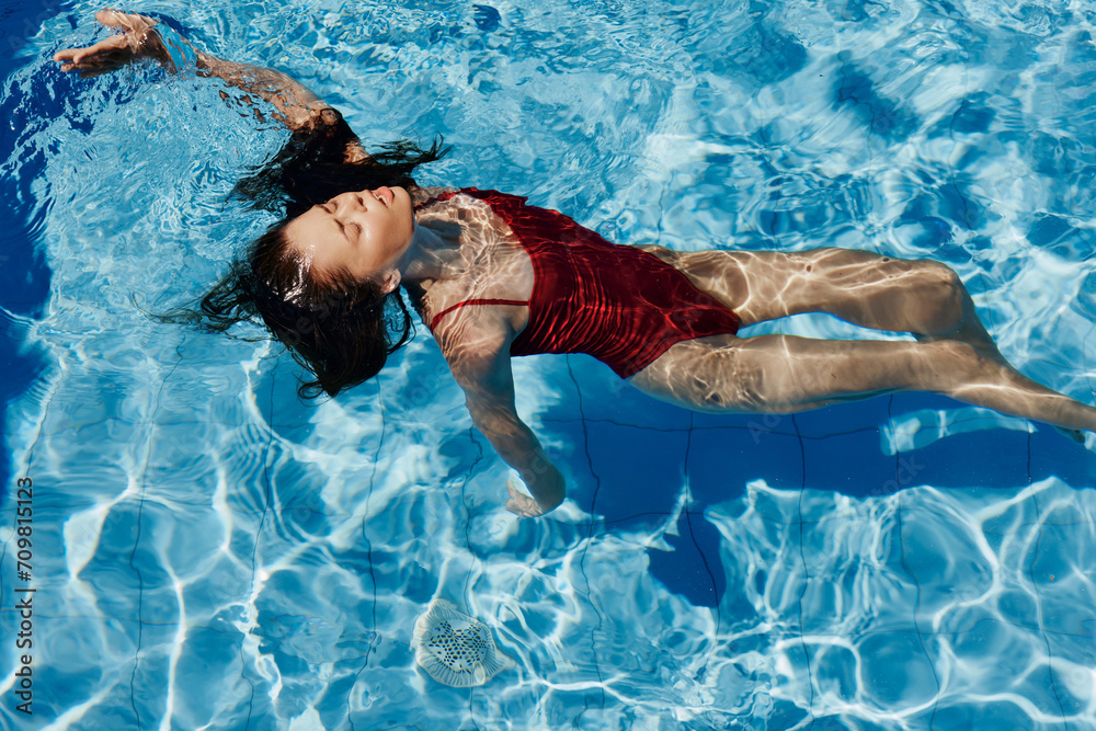 Person woman pool swim female summer water blue body young lifestyle