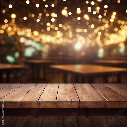 Empty wooden table mockup with defocused green and gold background, shamrock and golden glitter for Saint Patrick's Day designs © bahija