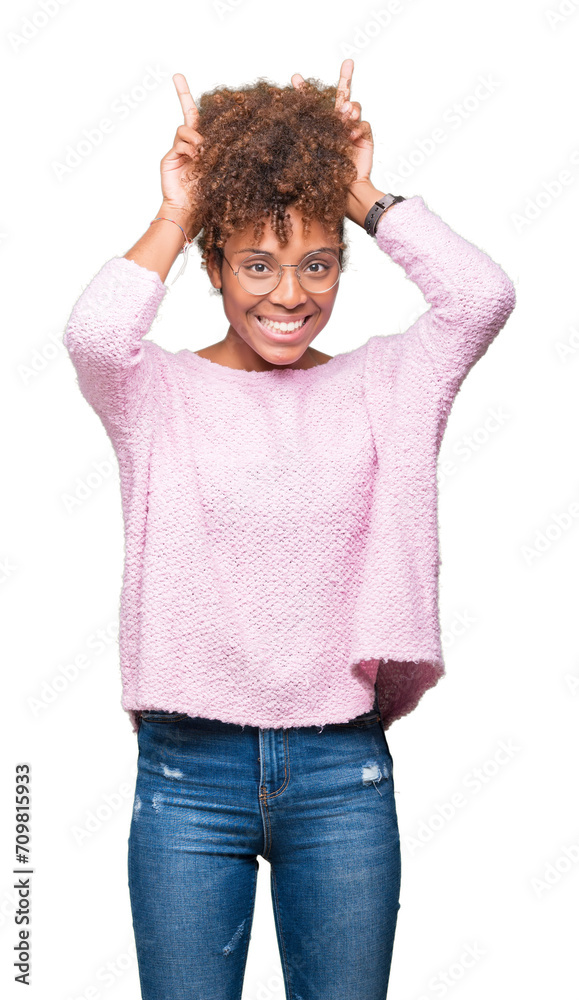Beautiful young african american woman wearing glasses over isolated background Posing funny and crazy with fingers on head as bunny ears, smiling cheerful Beautiful young african american woman wearing glasses over isolated background Posing funny and crazy with fingers on head as bunny ears, smiling cheerful