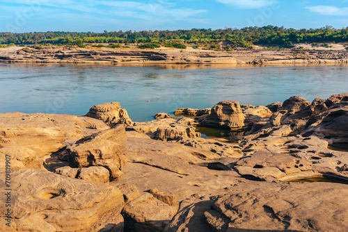 Grand Canyon in Thailand, Nature of rock canyon in Mekong River, Dry rock reef in the Mekong River with mountain hills. View of Sam Phan Bok is called Valley of Thailand. Nature landscape background.