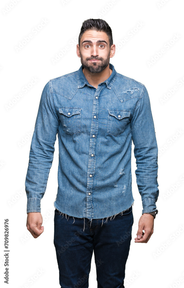 Fototapeta premium Young handsome man over isolated background puffing cheeks with funny face. Mouth inflated with air, crazy expression.