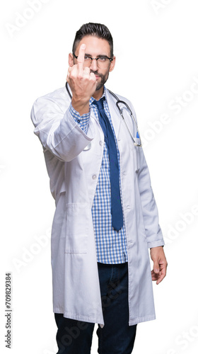 Handsome young doctor man over isolated background Showing middle finger, impolite and rude fuck off expression © Krakenimages.com