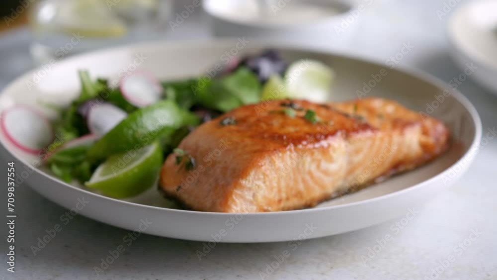 Grilled salmon fillet and fresh vegetable salad. Mediterranean diet. Grilled salmon fillet and fresh vegetable salad. Mediterranean diet.