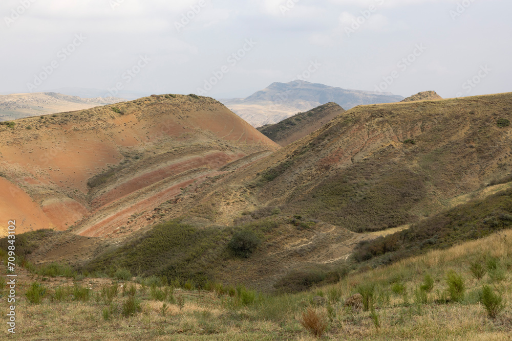 Landscape of Kakheti region in eastern Georgia with dry meadows and sandstone mountains
