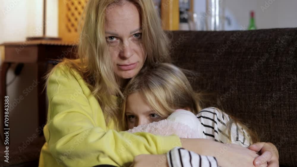 mother and daughter cry,hugging. Indoor Portrait,Stop Violence Close portrait of mother and daughter mother and daughter cry,hugging. Indoor Portrait,Stop Violence Close portrait of mother and daughter