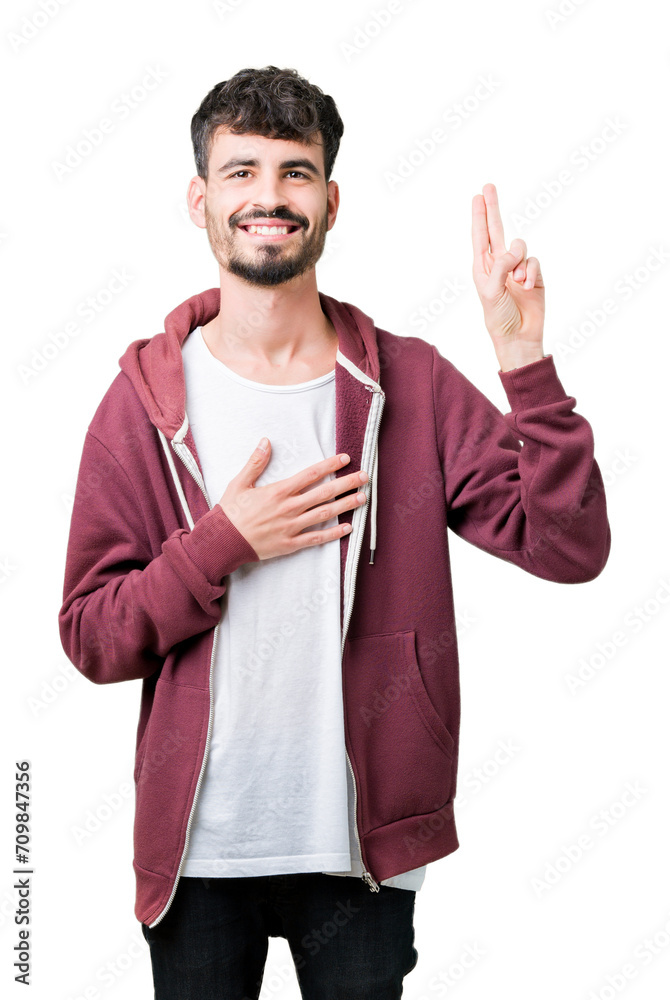 Young handsome man over isolated background Swearing with hand on chest and fingers, making a loyalty promise oath Young handsome man over isolated background Swearing with hand on chest and fingers, making a loyalty promise oath