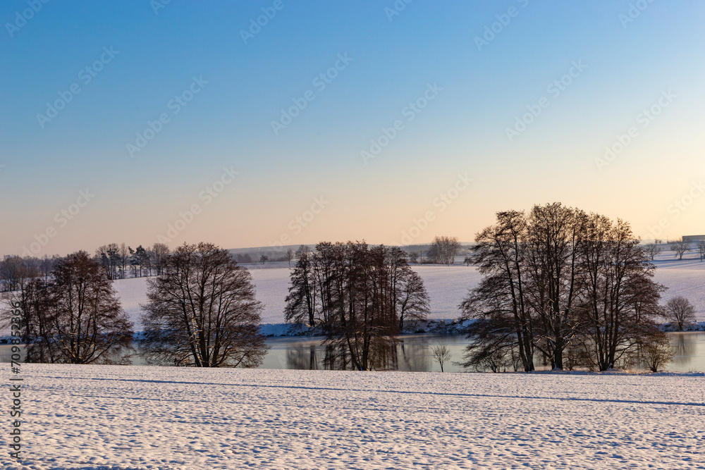 A cold winter evening in Central Europe. Czech countryside. A cold winter evening in Central Europe. Czech countryside.