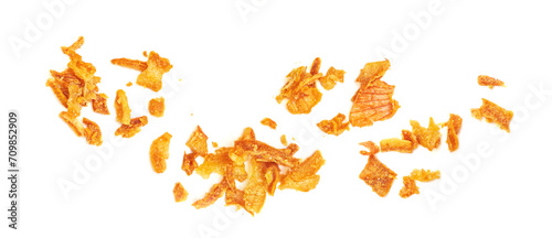 Pile of crispy fried onions isolated on white.  Roasted Onions Top view. Flat lay. photo