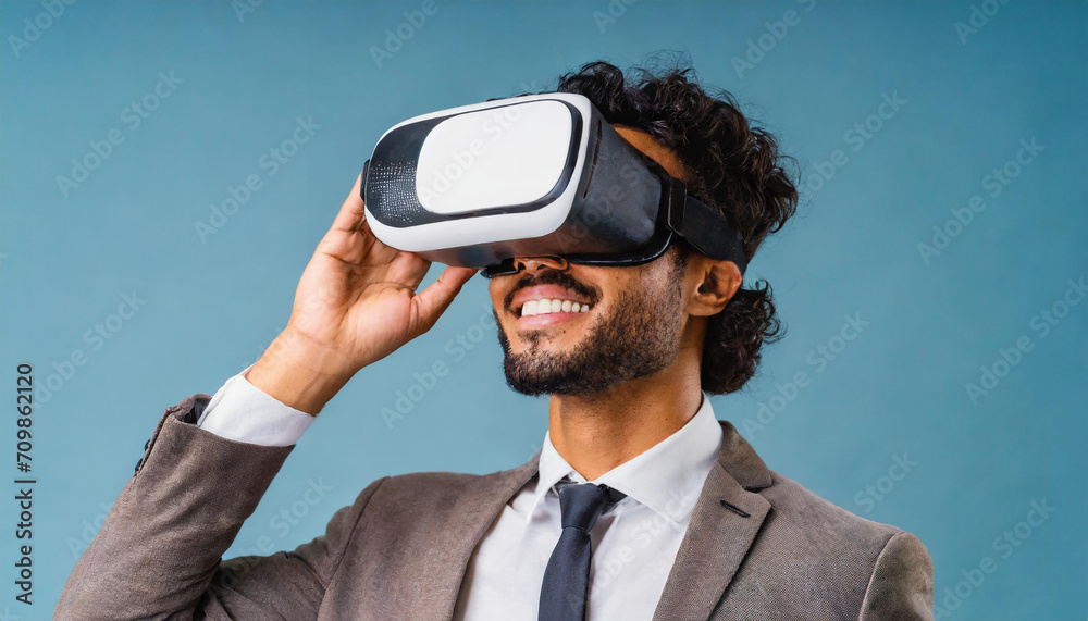 Man wearing virtual reality goggles in a studio Man wearing virtual reality goggles in a studio