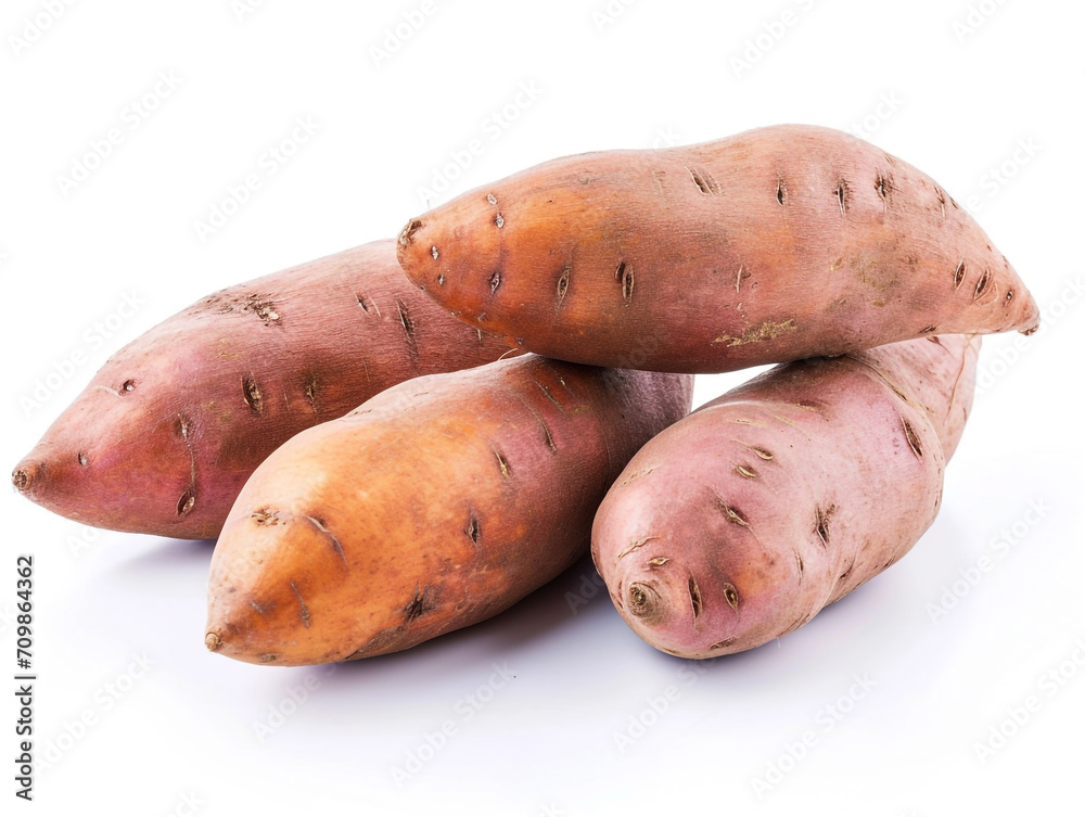 Fresh sweet potatoes isolated on a white background. Minimalist style. Fresh sweet potatoes isolated on a white background. Minimalist style.